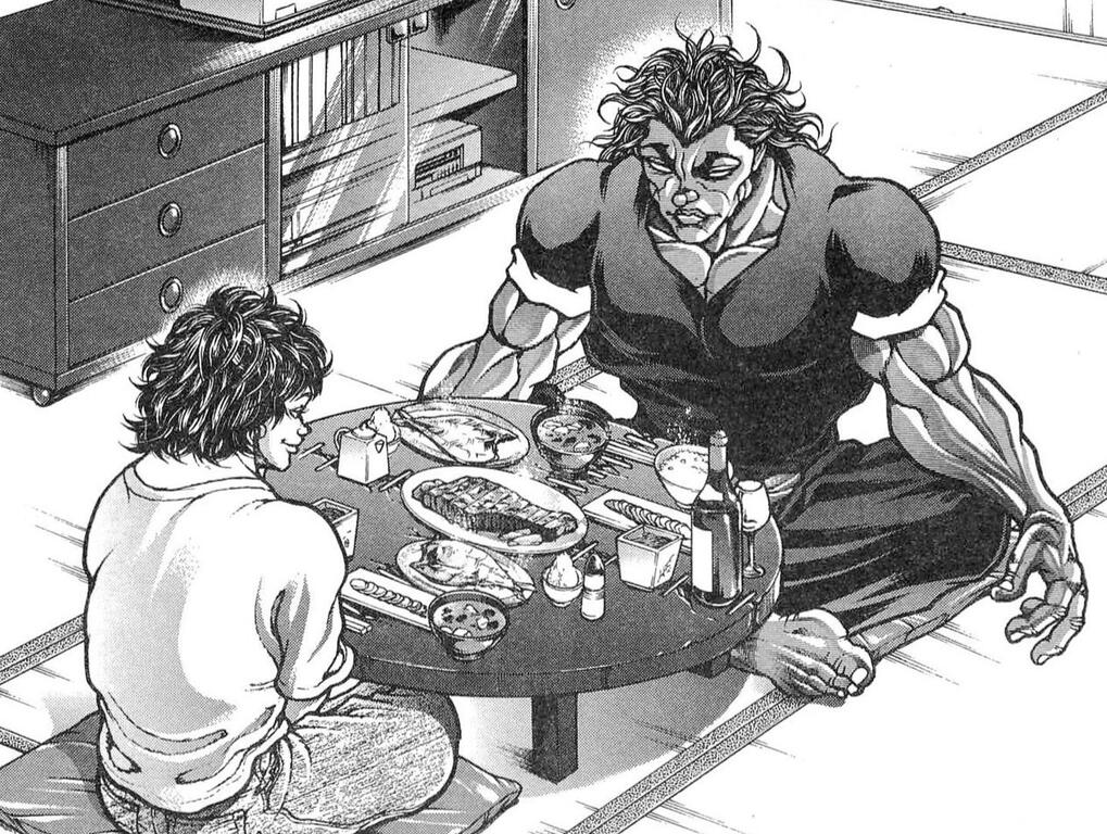 a panel from the hanma baki manga. baki and his father yujiro are sitting across from each other at a chabudai table laid out with dinner.